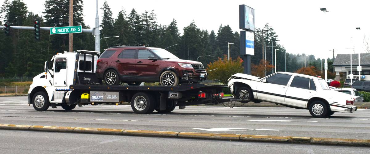 Comparison of credit roadside towing vs traditional towing services
